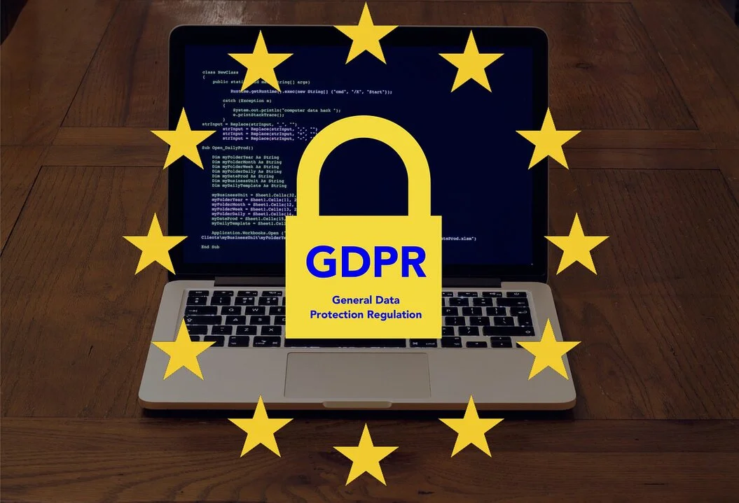 Data and privacy officer reviewing compliance documentation and dashboards.