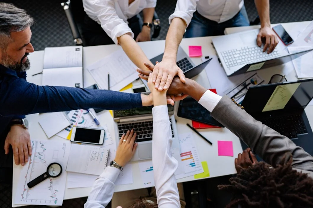 Business professional concluding a strategic partnership in a formal setting.